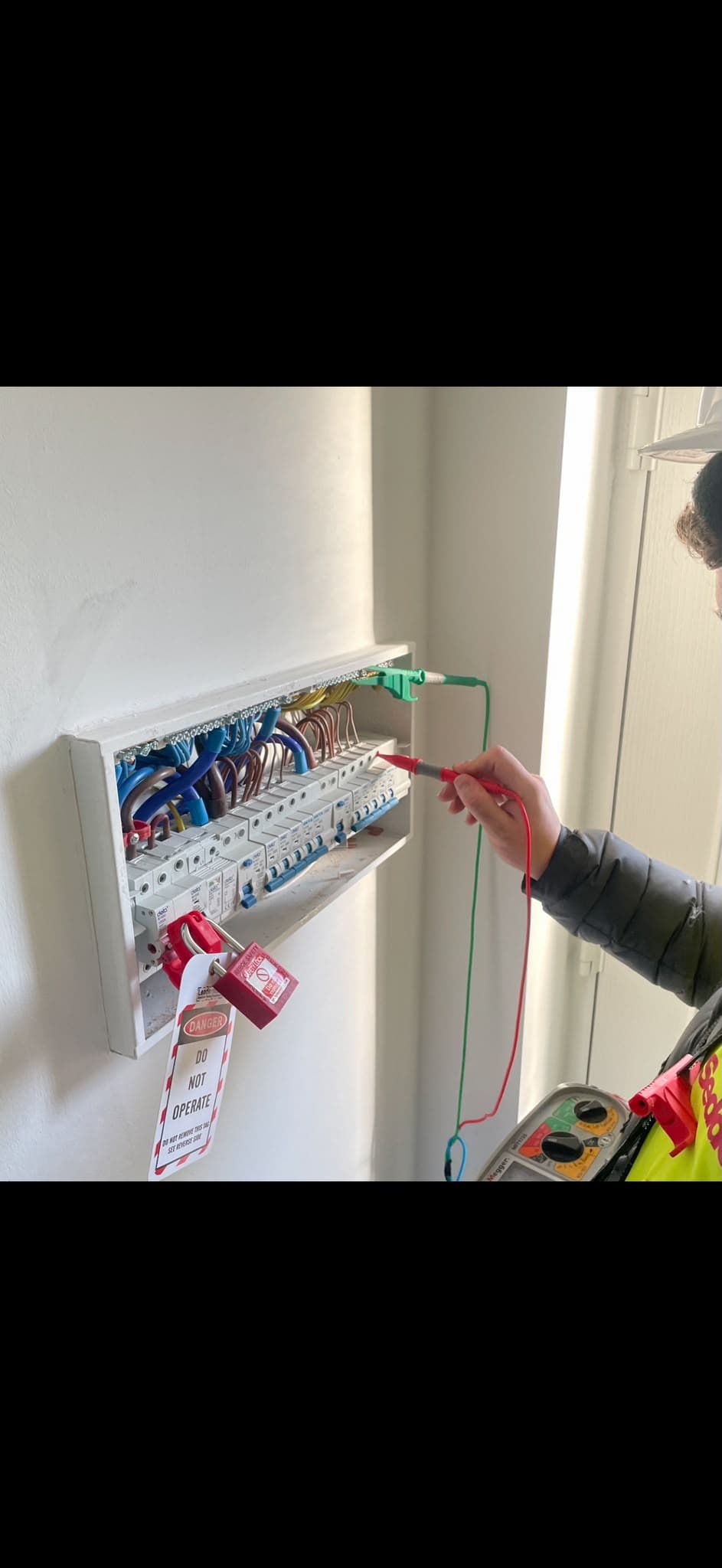 Onyx Electrical Solutions electrician testing a consumer unit with a Megger multifunction tester during fault diagnosis
